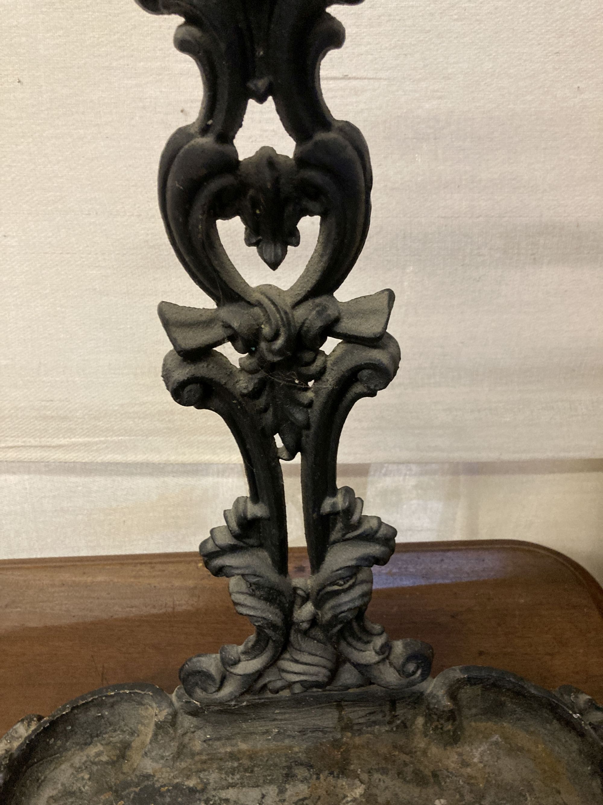 A Victorian style black painted cast iron stick and umbrella stand, width 45cm, depth 18cm, height 63cm